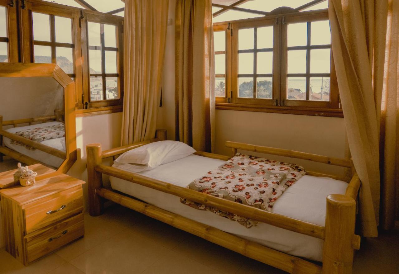 Hostal Poseidon Puerto Cayo Buitenkant foto